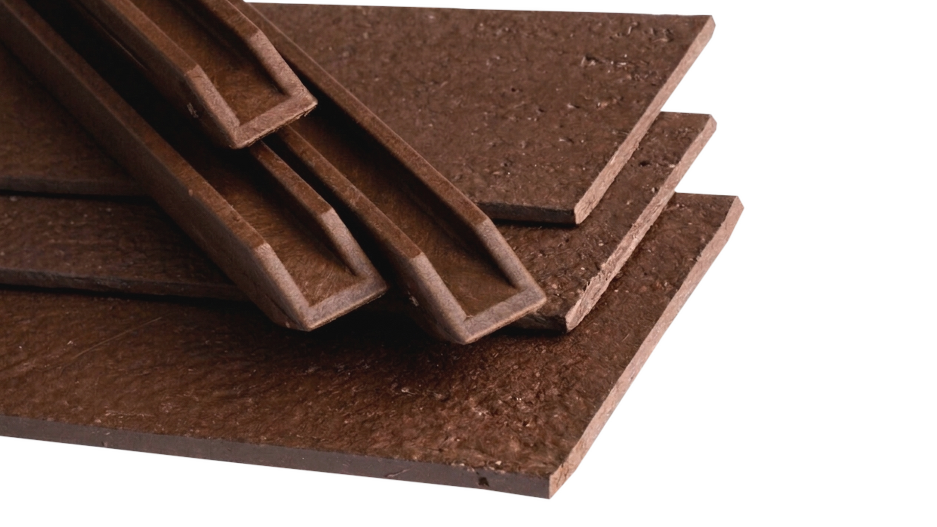 Stacked brown wooden boards with tongue-and-groove edges on a white background